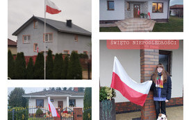 na zdjęciu widać uczni&oacute;w z flagami Polski